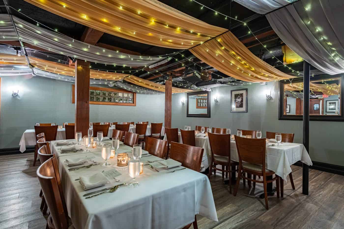 Milestone celebration setup in providence private dining room with warm ambiance