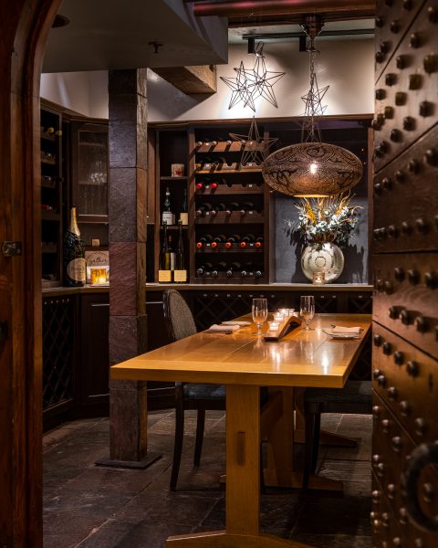 Executive meeting in sophisticated private wine room Providence
