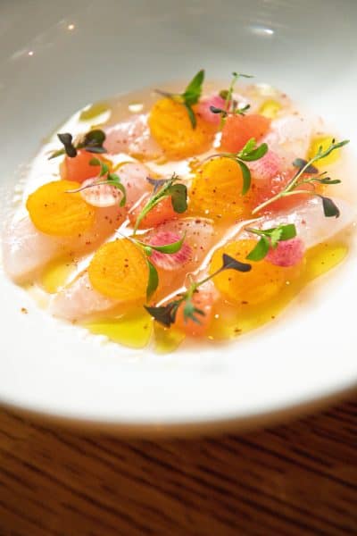 Fine dining main course with wine pairing at Gracie’s Providence